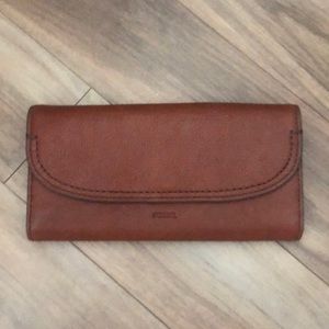 Brown leather fossil wallet. Never been used.
